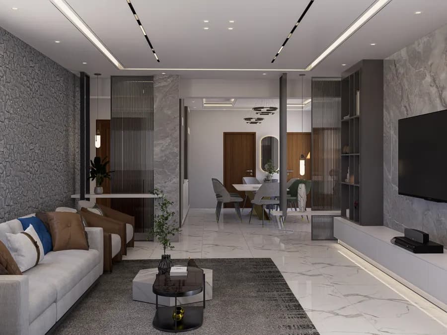 Modern living room with plush sofa, area rug and ring chandelier