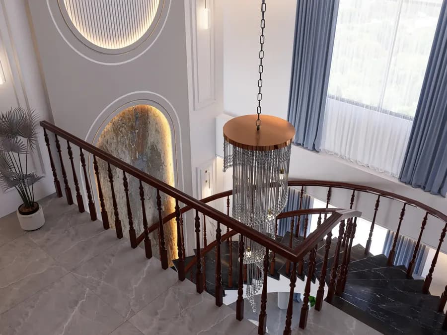 Duplex home interior with chandelier lighting in stair area